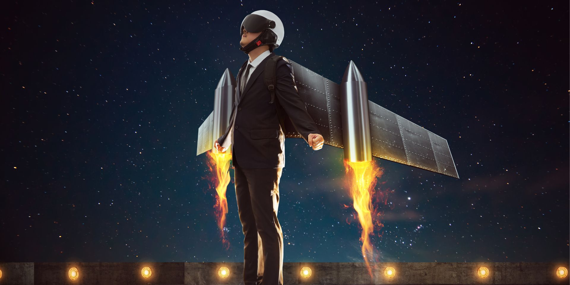 A man wearing a suit and a jetpack.