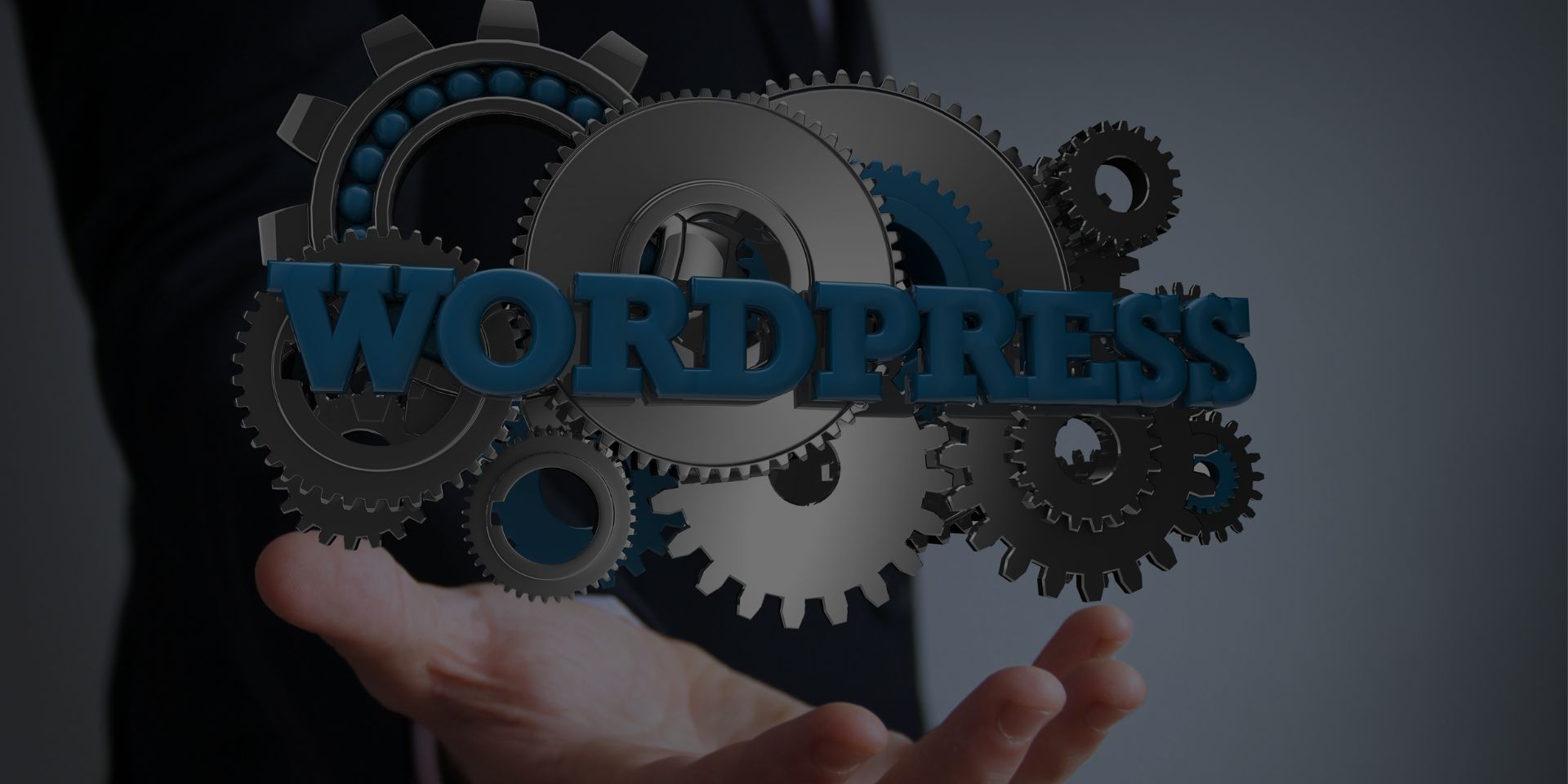 Business man holds wordpress sign, surrounded by cogs.