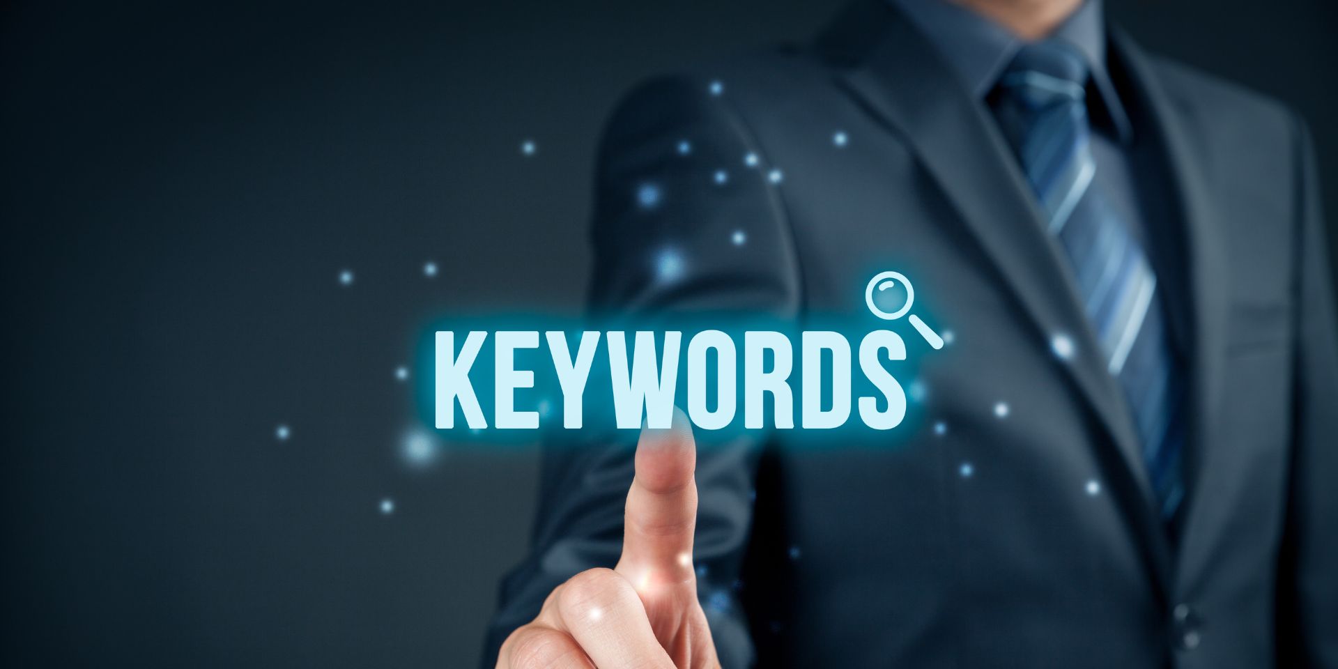 A man clicks on the phrase "keywords".